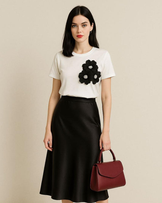 CAMISETA FLORTES NEGRA A UN LADO